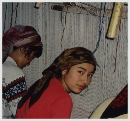 Girls weaving silk rug
